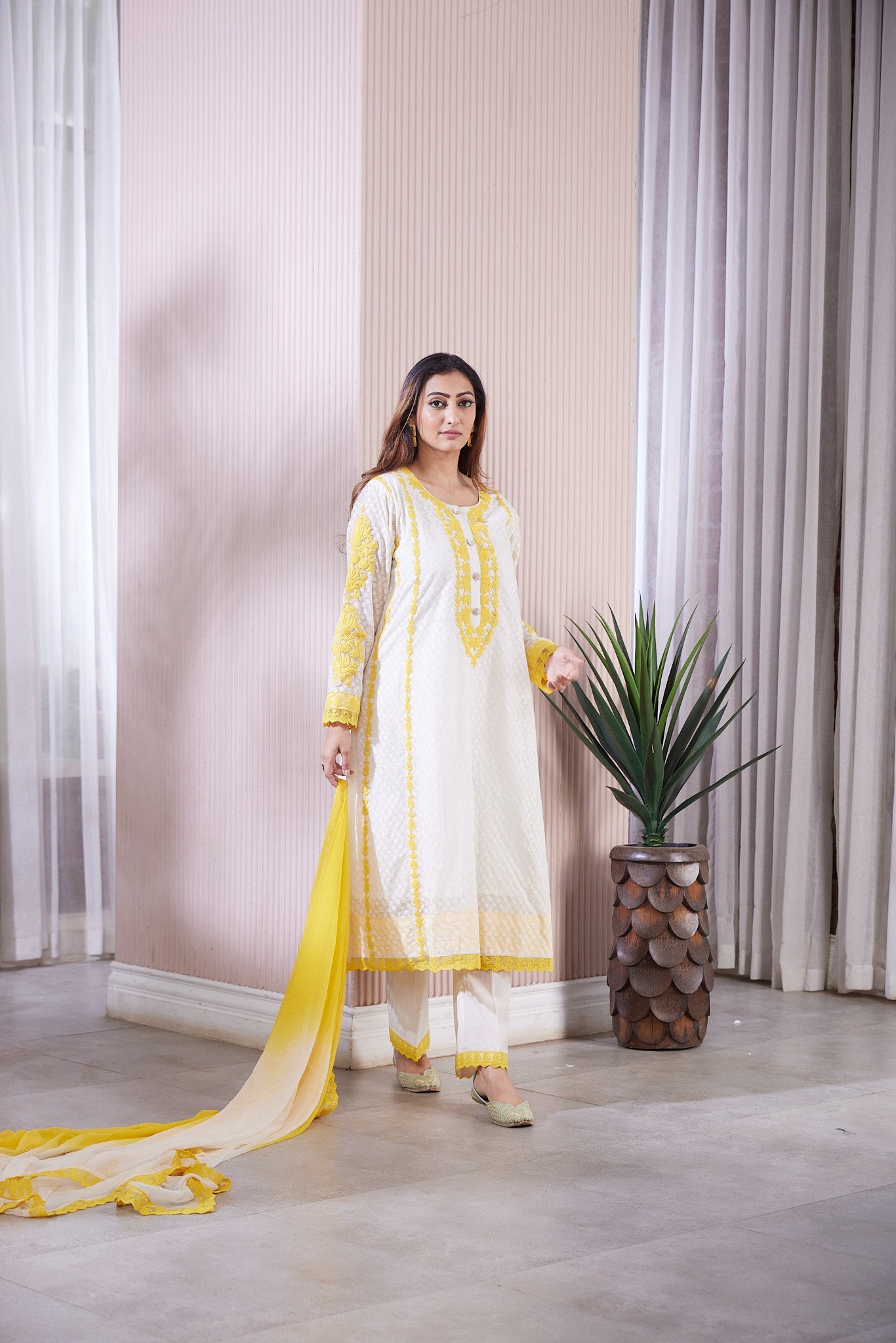 Kalidar kurta with pockets and dori work along with straight pants