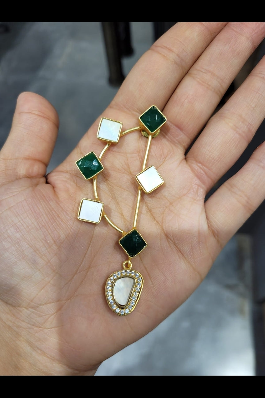 The D Earrings (White & Blue Stones)