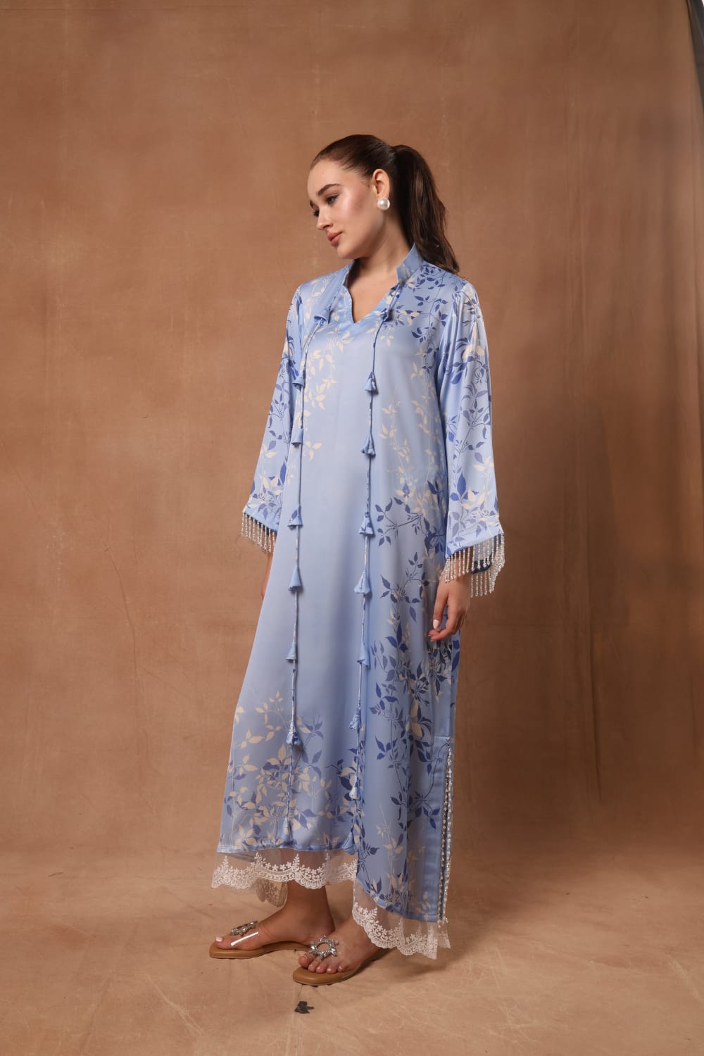 Long kaftan Embellished with pearl and crystal in the sleeves and slit on the kaftan