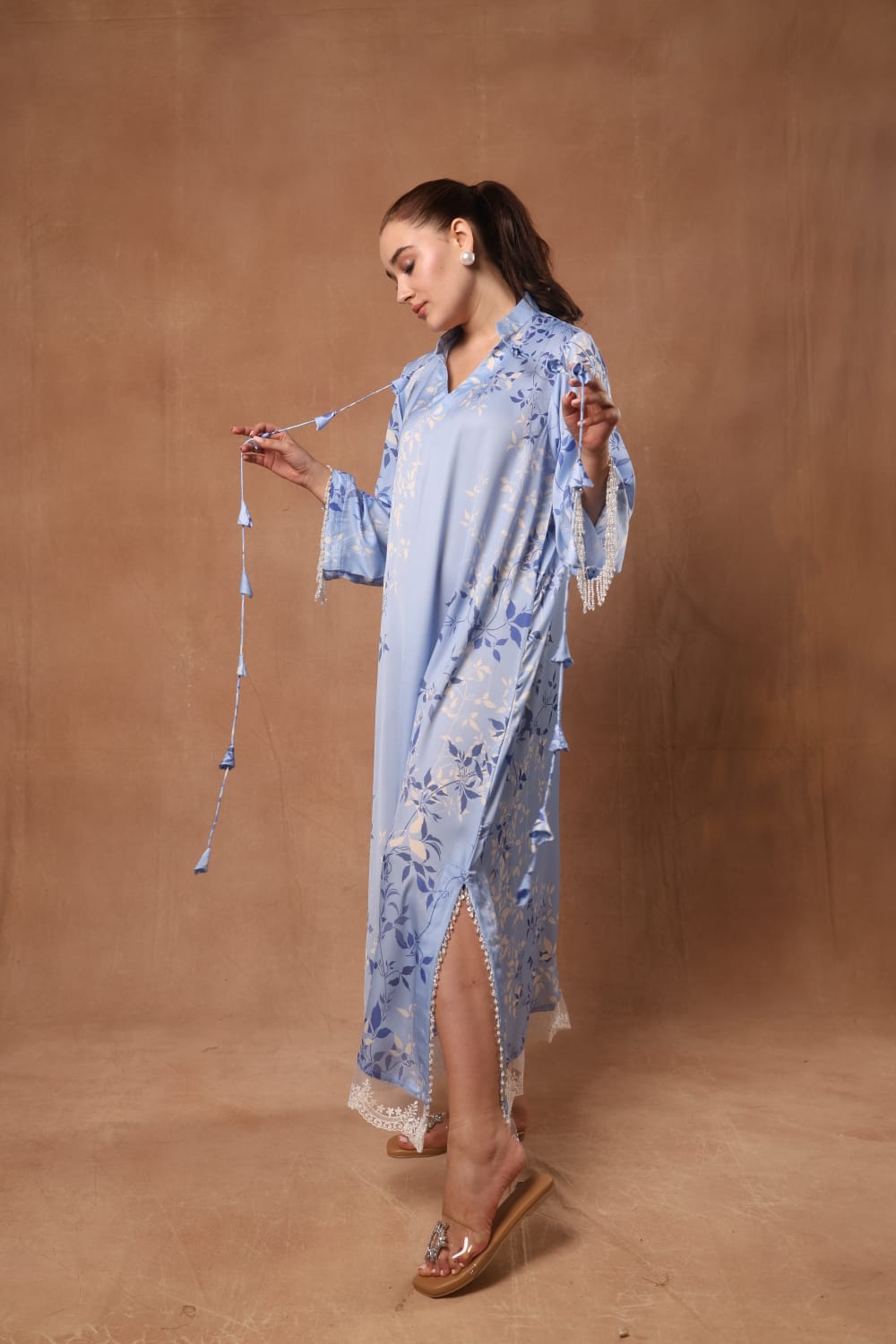 Long kaftan Embellished with pearl and crystal in the sleeves and slit on the kaftan