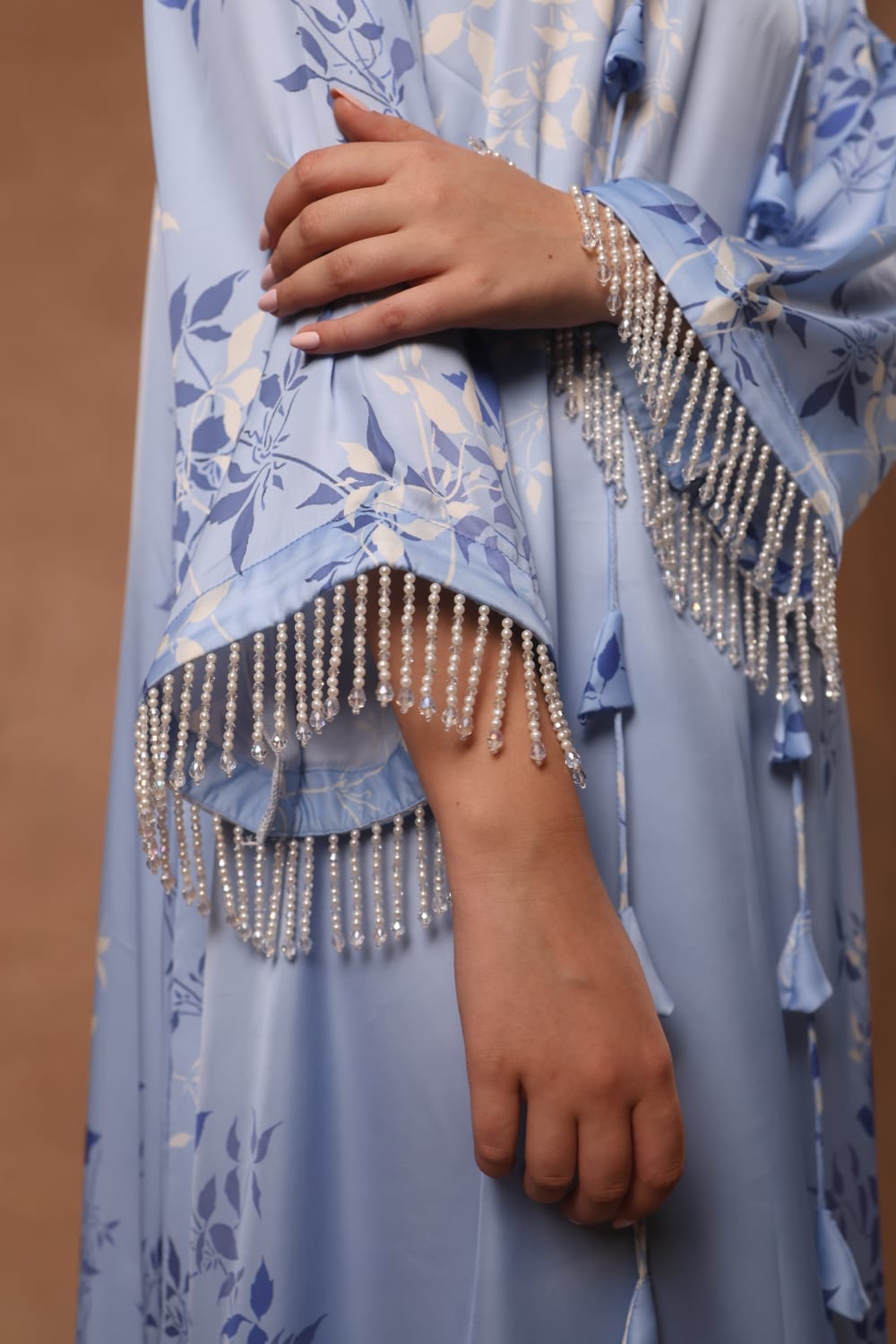 Long kaftan Embellished with pearl and crystal in the sleeves and slit on the kaftan