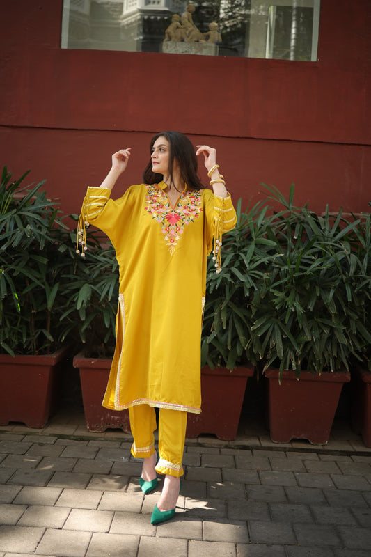 kurta and pants with kashmiri aari work along with tassels on sleeves Straight pants