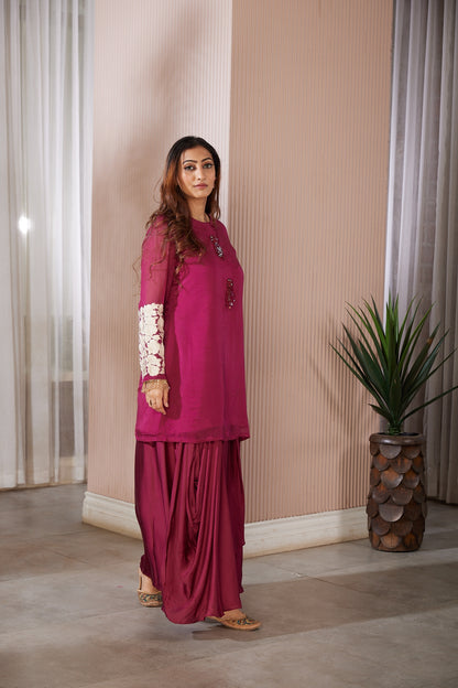 Long skirt with elegant drapes with a short kurti sleeves fully Resham worked with crystal hangings