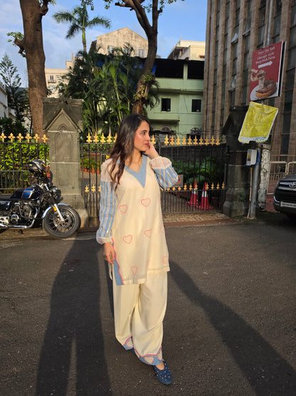Short kurta with pleated salwar