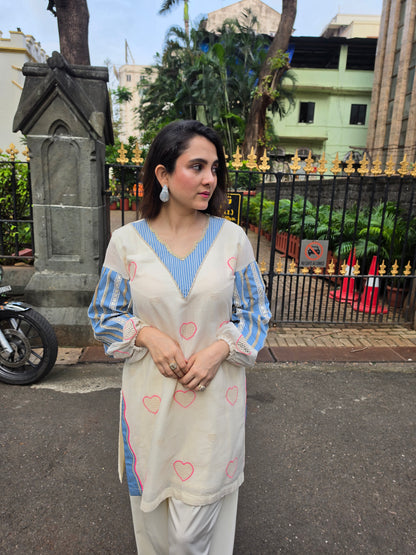 Short kurta with pleated salwar