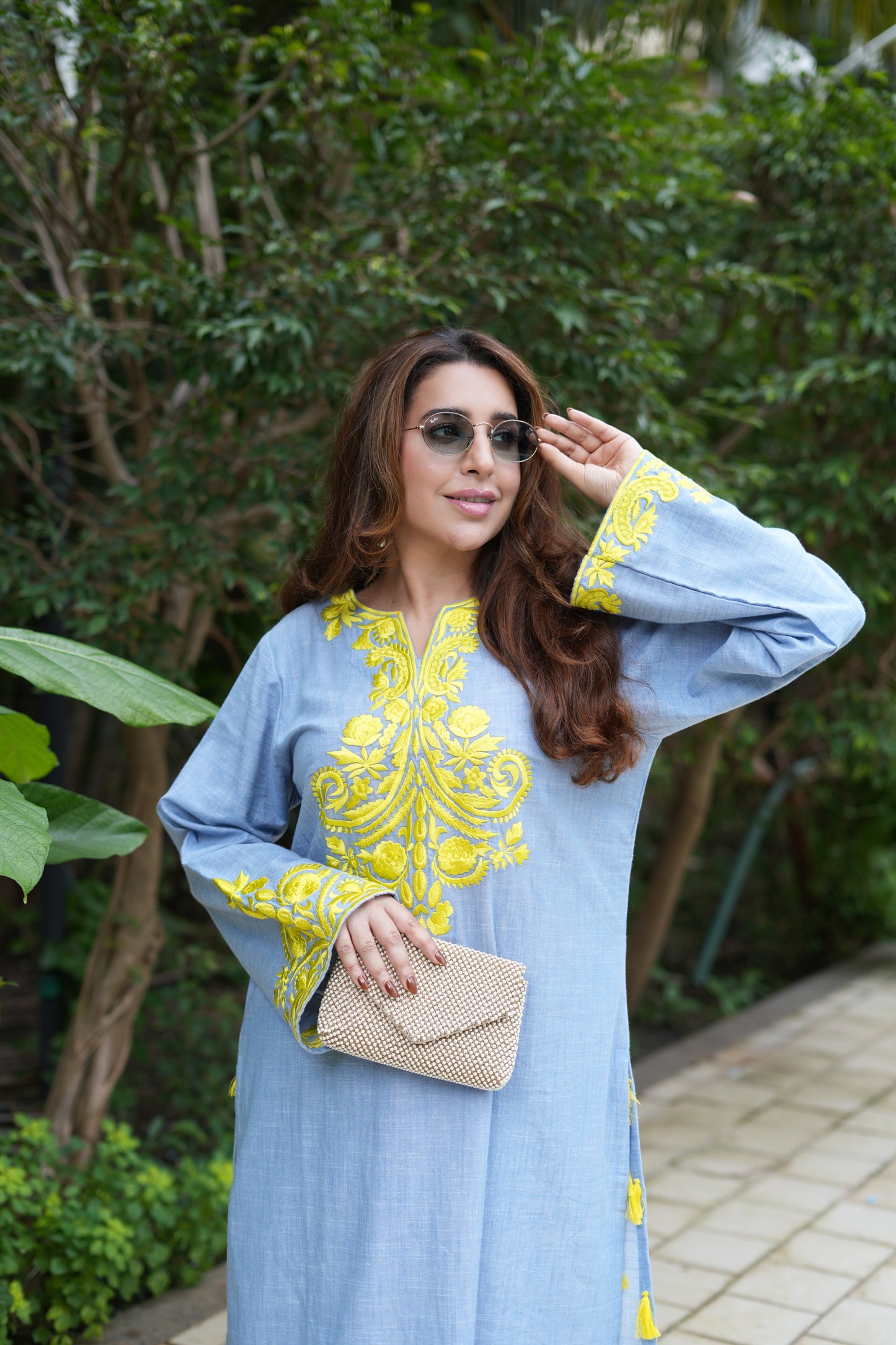 Embroidered Kurta and Pants with Tassel Accents