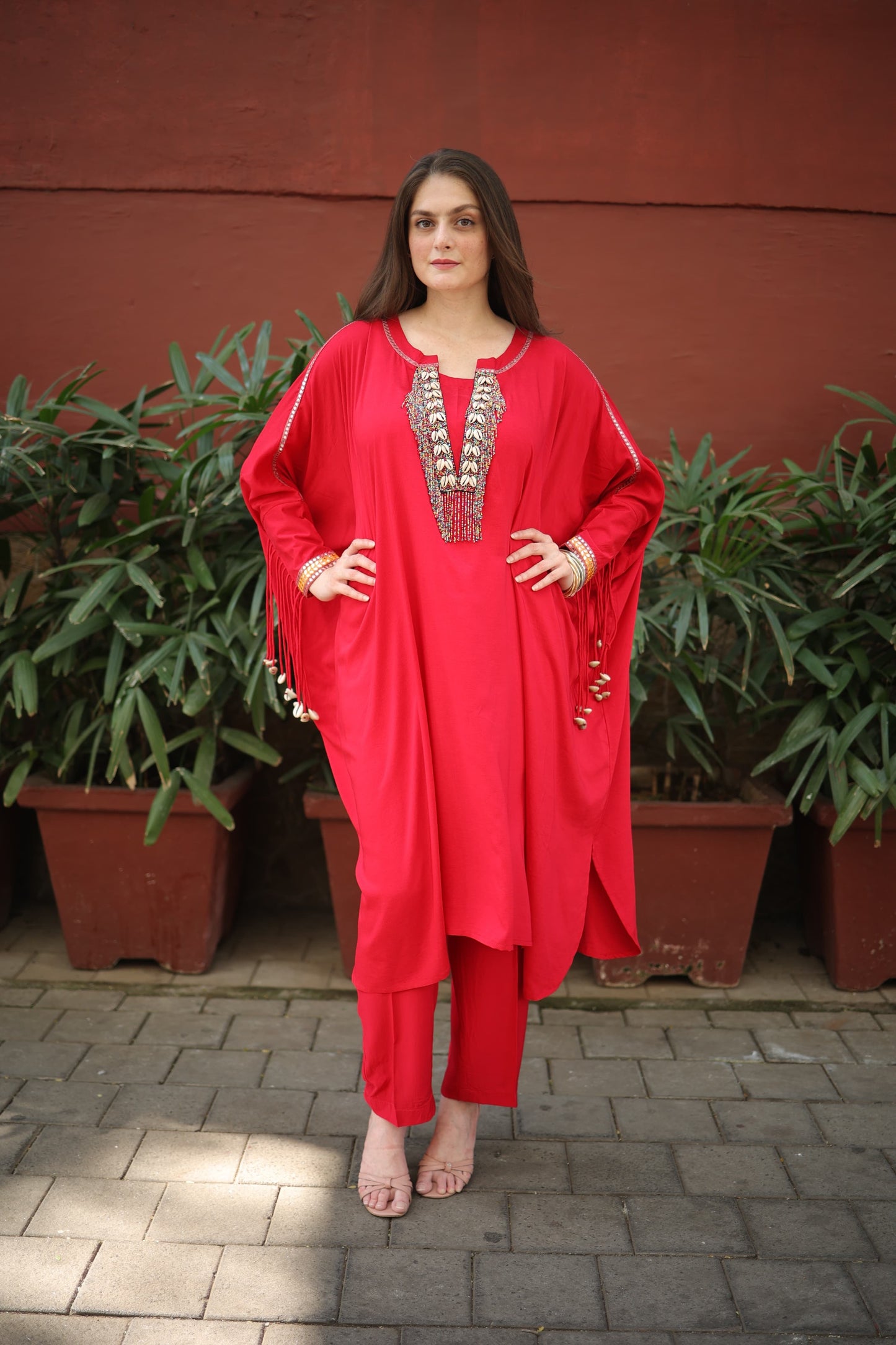 kaftan with tassels on Sleeves with shells Neck with she'll and beads work, Straight pants