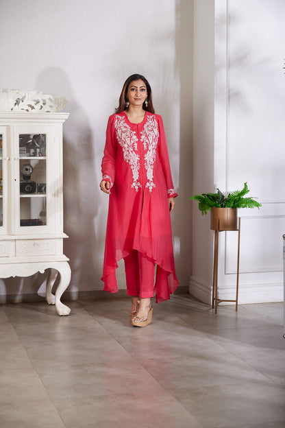 A top cut in a indowestern asymmetrical style with beautiful Resham pearl and cutdana handwork