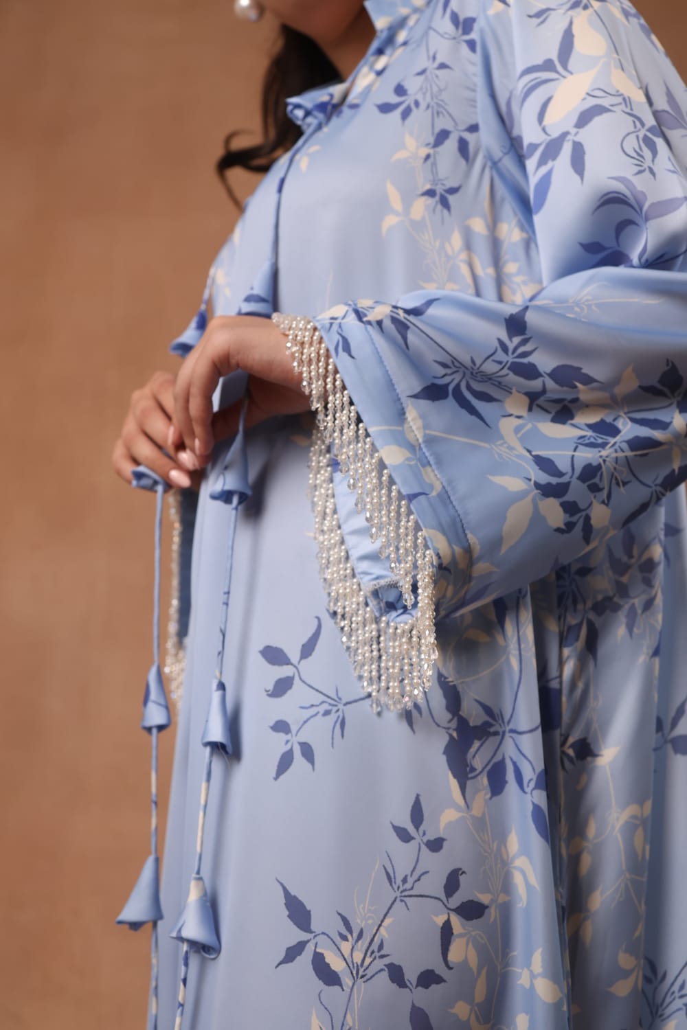 Long kaftan Embellished with pearl and crystal in the sleeves and slit on the kaftan