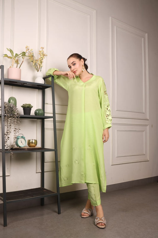 Long kurta and straight pants with cutwork sleeves and work in the Daman