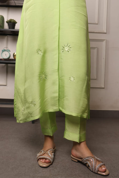Long kurta and straight pants with cutwork sleeves and work in the Daman