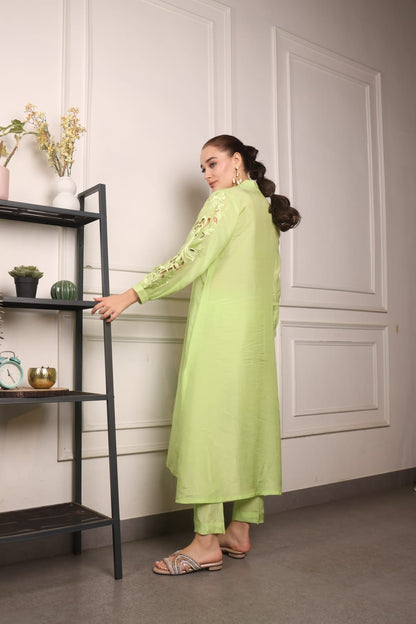 Long kurta and straight pants with cutwork sleeves and work in the Daman