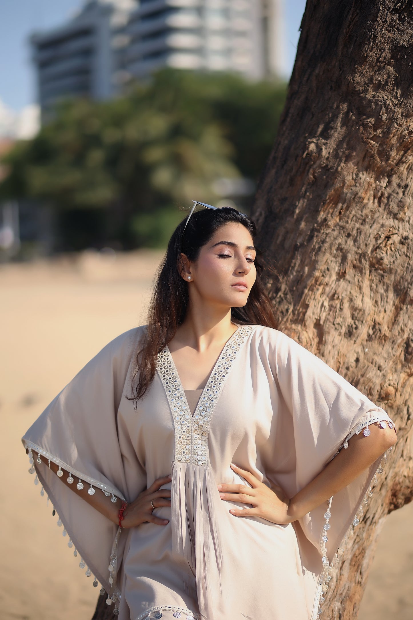 V neck with gathers kaftan kurti with white and gold work and latkan