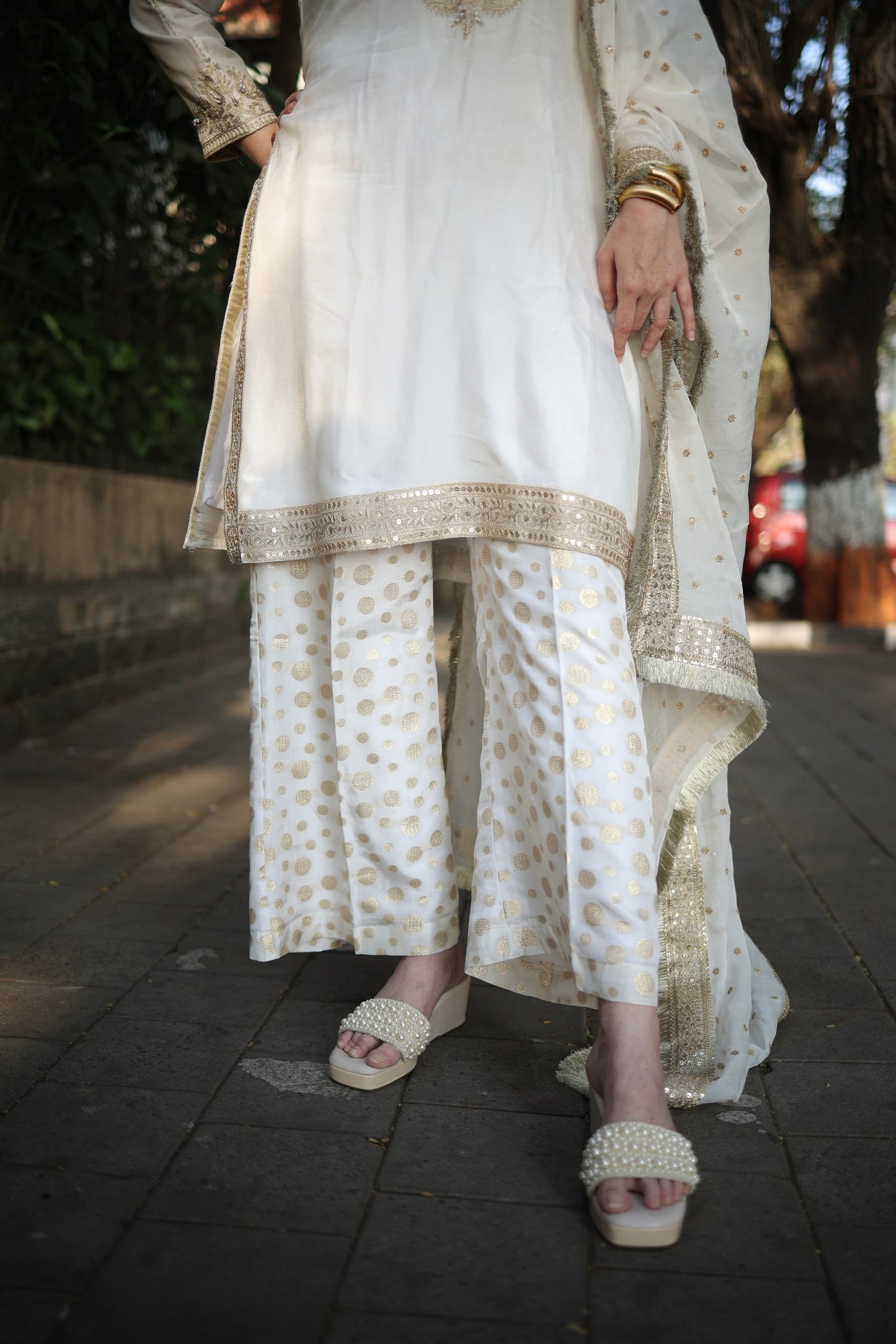 Kurta with gold Aari pear and stone work along with chanderi brocade pants organza silk dupattah