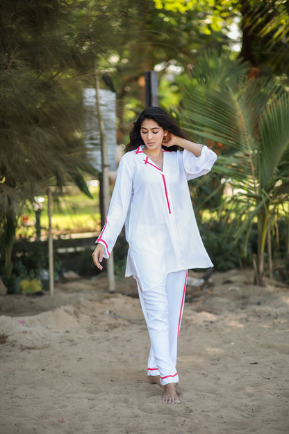 Shirt and pant co-ord with a pop of hot pink on colar, cuff and pant