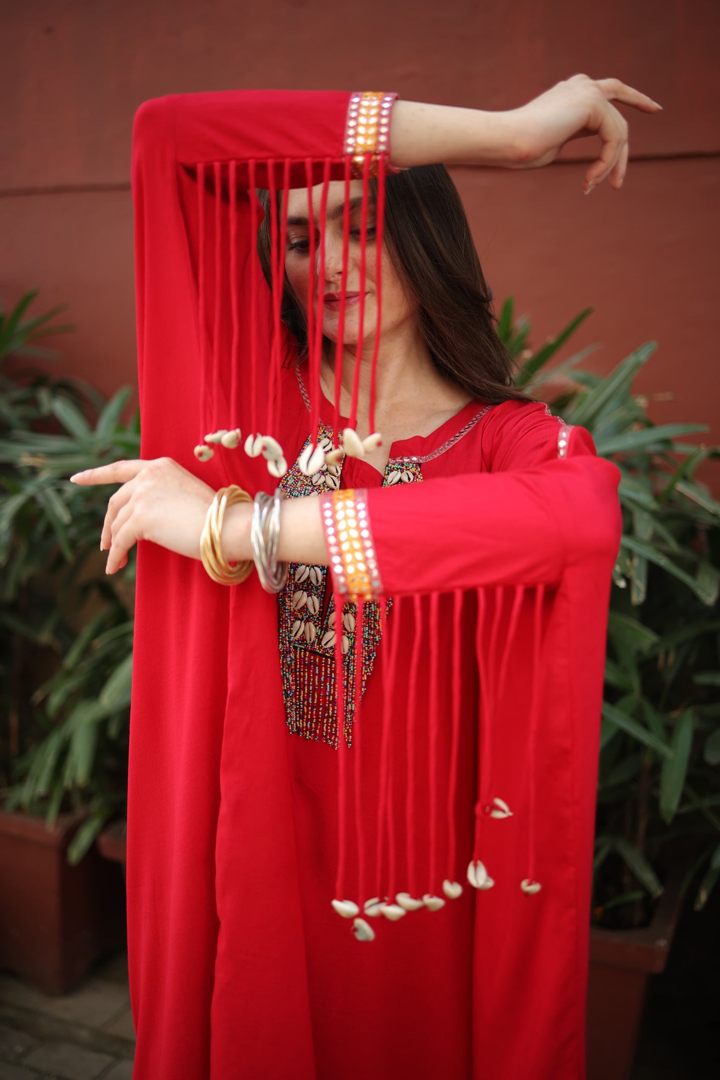 kaftan with tassels on Sleeves with shells Neck with she'll and beads work, Straight pants