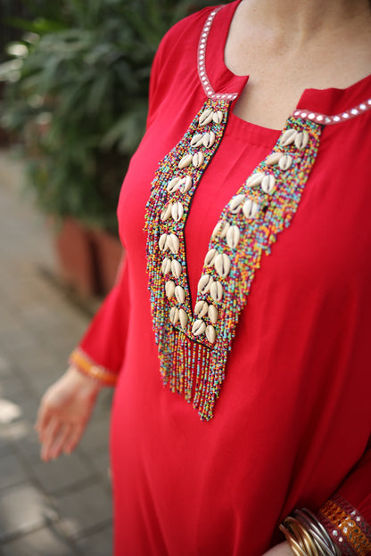 kaftan with tassels on Sleeves with shells Neck with she'll and beads work, Straight pants