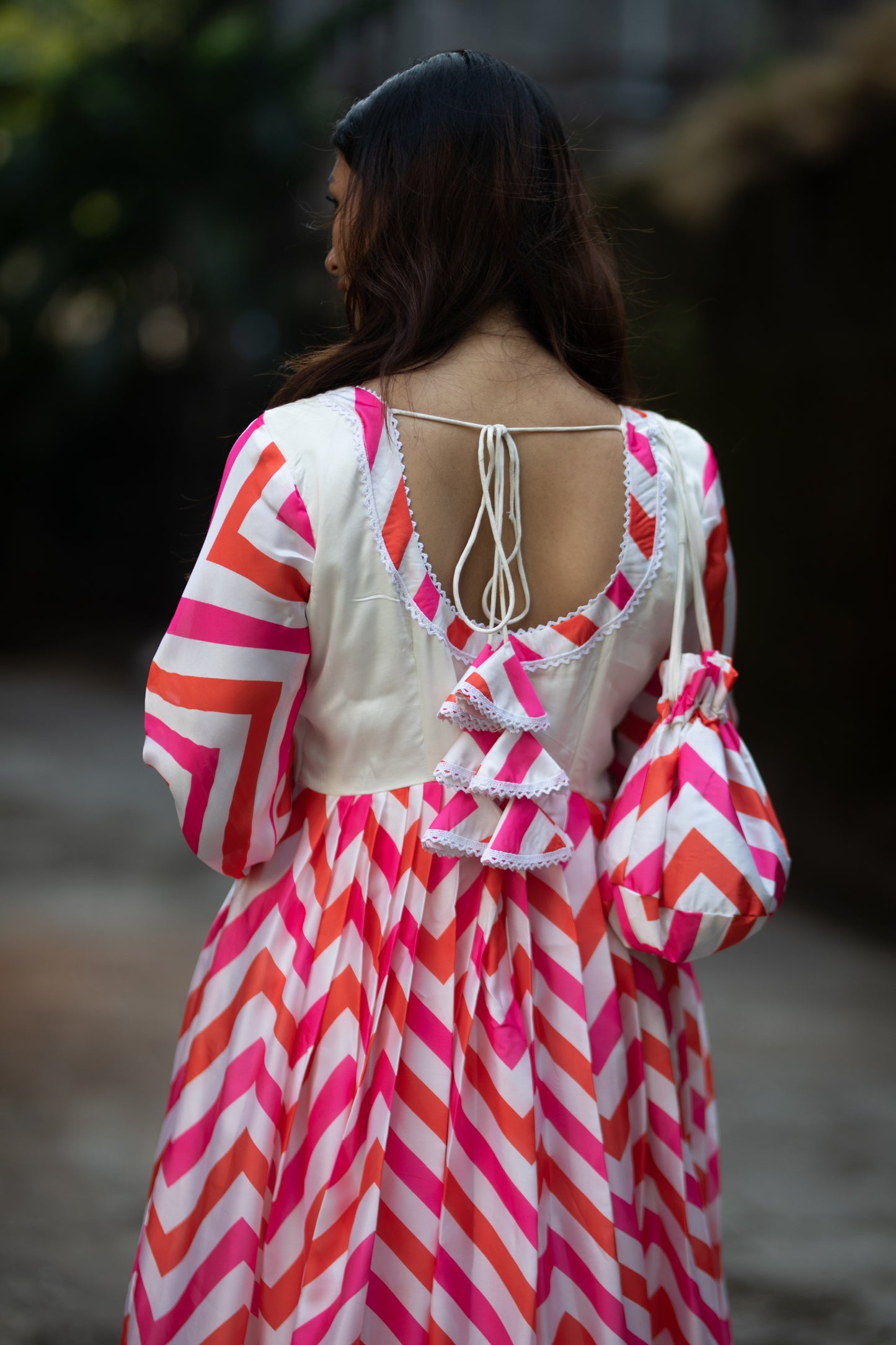 Candy crush pleated dress with organza thread work Dupatta with a potli bag