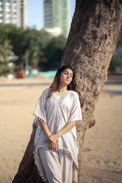 V neck with gathers kaftan kurti with white and gold work and latkan